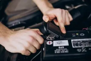 alt:Irvine, CA electrician installing battery for generator backup power